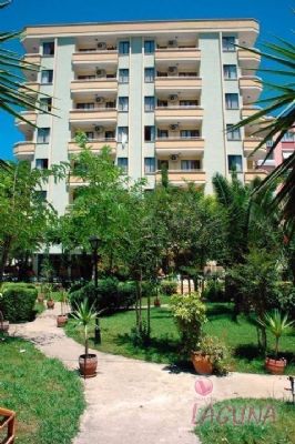 Otelimiz Antalya �ehir merkezinde , hem �ehir hemde tatil oteli olanaklar� ve �zelliklerine sahip 52 Adet �� odal� Suit ,12 Adet 1+1 Junior Suit toplam  64 dairel ve 196 yatak kapasiteli Turizm Bakanl��� belgeli 3 + y�ld�zl� bir tesistir.<br><br>  

Otelimiz ; Antalya havaliman�na 15 Km. mesafede , Antalya �ehrinin e�siz tarihi ve k�lt�rel �zelliklerini yans�tan , kendine �zg� mimari yap�s�yla 

tarihe tan�kl�k eden '' Y�VL� M�NARE '' ve B�g�n hala ya�ayan '' Eski �ehir '' g�r�n�m�ndeki '' Kale i�i '' semtine 900 metre uzakl�kta , Antalya 

�ehrinde ya�am�� t�m uygarl�klara be�iklik eden ve bu uygarl�klar�n ,K�lt�rlerin izlerini yans�tan '' Antalya M�zesine '' 350 Metre mesafede , 

D�nyan�n en �nl� ,en  uzun ve en  temiz sahillerine sahip Konyaalt� plaj�na ( Beach Park )  ta��tla sadece 5 dakika , Denize uzakl��� Ku� u�u�uyla 400 metre uzakl�ktad�r.

  

Otelimizde ( BB ) Oda kahvalt� , ( HB ) Yar�m Pansiyon , ( ALL.INKL) Her�ey dahil , ( APART ) Sadece daire. 

Sistemlerinin herbiri istege g�re uygulanmaktad�r.  
<br><br>Our hotel is in the city centre three star hotel with the city hotel opportunities and holiday hotel opportunities. We have 52  Suits with 3 bedroom, 12 junior bedroom with 1+1 bedroom as total 196 beds. <br><br>

It is only 15 km. from Antalya International Airport, 900 m. from old city centre and world famous Yivli Minare and Kalei�i, 350 m. from  museum of Antalya where you can see the traces and signs of many civilizations lived in Antalya, 5 minutes by bus to the one of the most famous, longest and cleanest of he world Konyaalri Beach and 400 m. to the see. 

  
You will be served (BB) Room �breakfast, (HB) half pansion, (ALL INCL.) All inclusive or (APART) only flat system up to your wish. 
